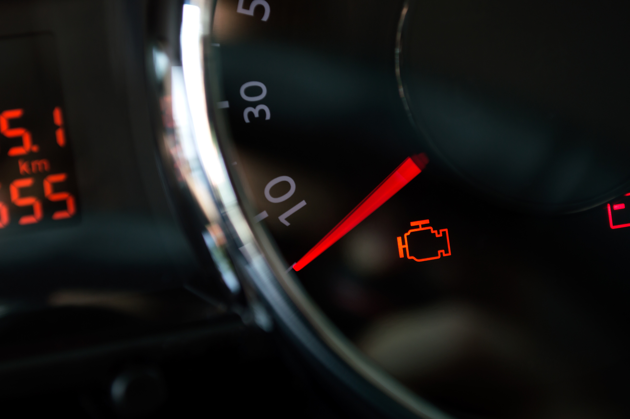 Check engine light. Car dashboard in closeup